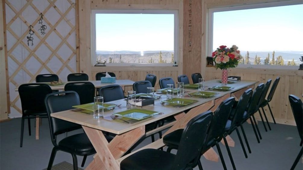 Dining room with large windows in Fairbanks