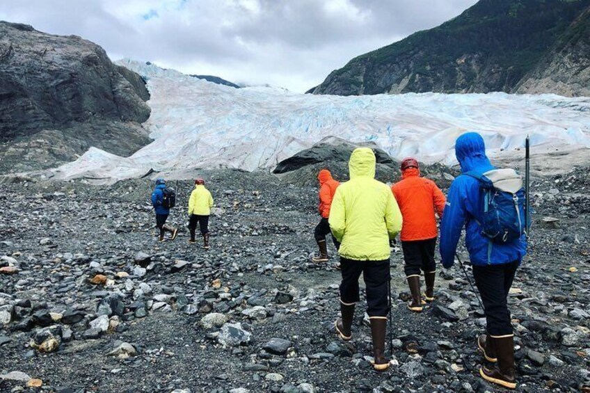 Trekking on the rocky moraine to the glacier
