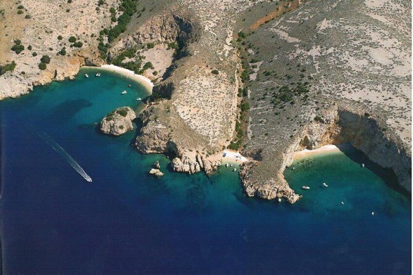Take a boat with capt. Bobo (4h wild bays trip, with swimming & snorkeling)