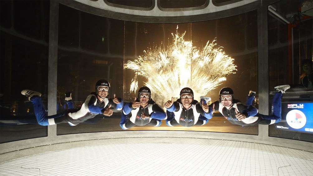 Show item 3 of 5. Group having fun at iFly Singapore