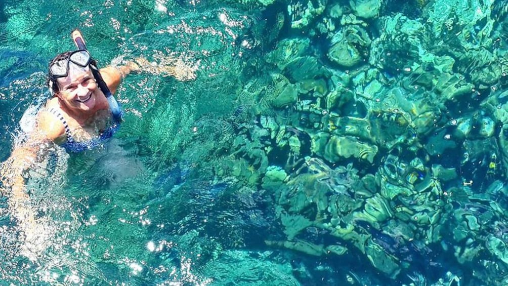 woman snorkeling in Trinidad and Tobago