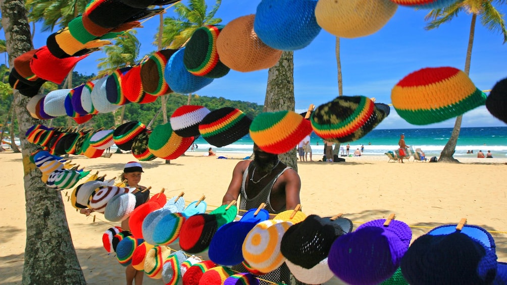 colorful hats for sale at the beach in Trinidad and Tobago
