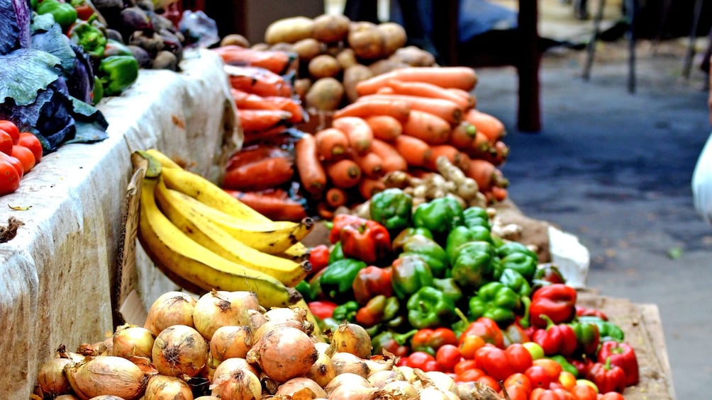 walking through a produce market in Trinidad and Tobago