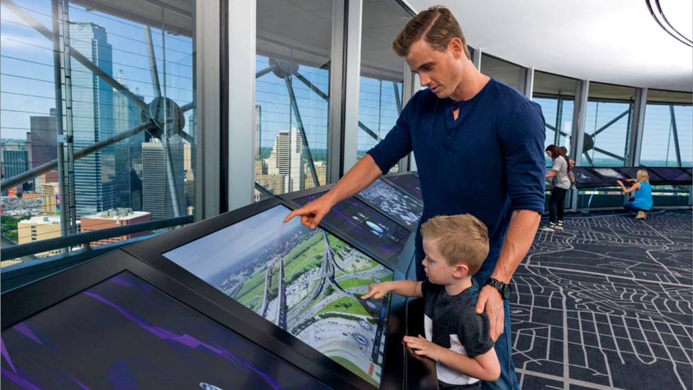 father and son in the observation deck in Dallas