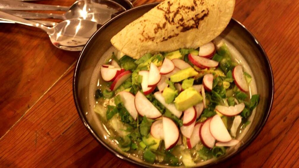 A tortilla in a Mexican salad bowl