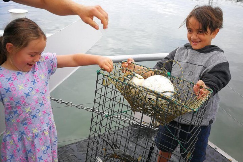 It takes more then two little hands to pull up these crab pots!
