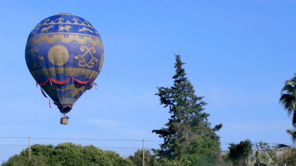 Show item 4 of 5. Hot air balloon over Mallorca Island