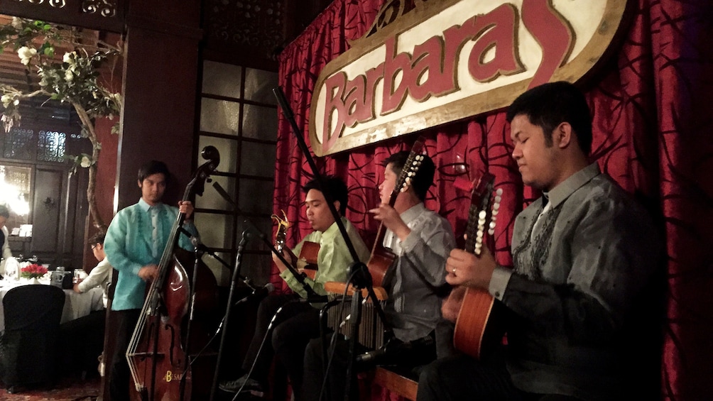 Musicians playing at Barbara's in Manila