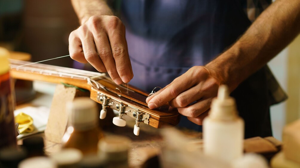 Guitar being restrung in Cebu