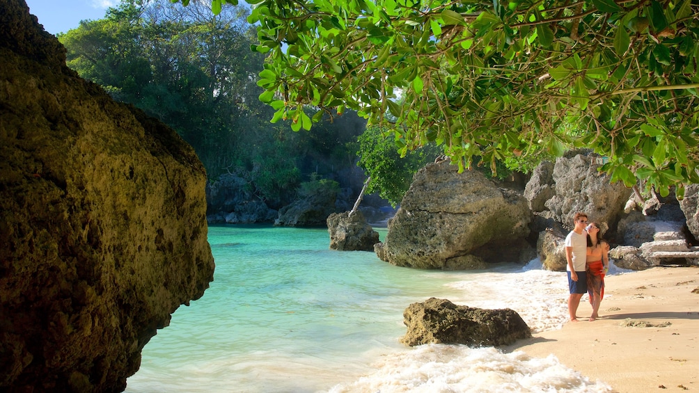 Two people on a beach in Philippines