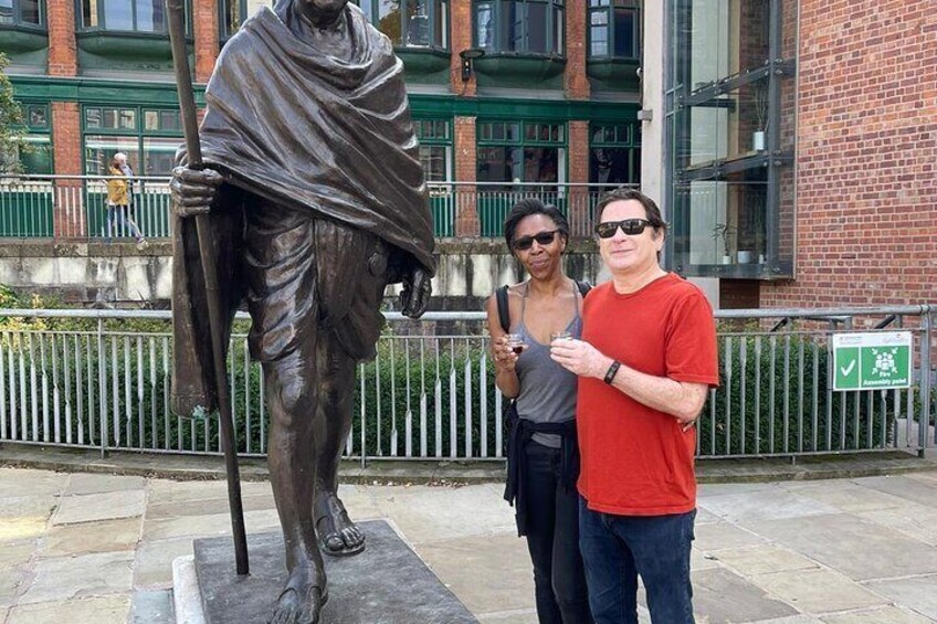 Visiting the Ghandi statue on our vegan food tour
