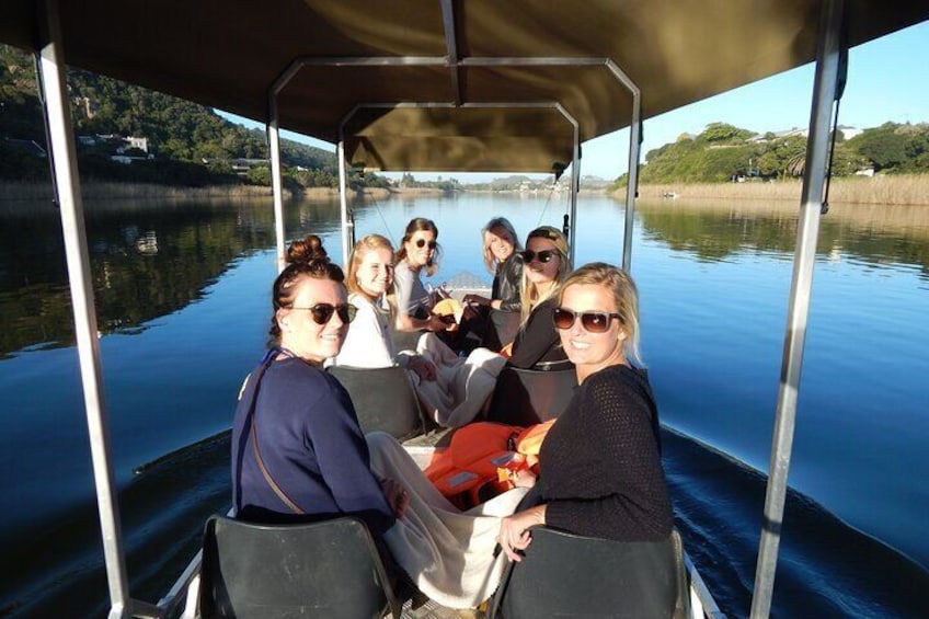 Happy tourists enjoying a cruise