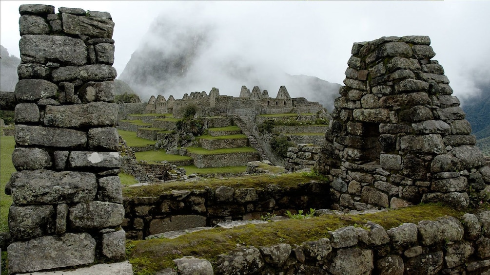 Machu Picchu ruins in the mist