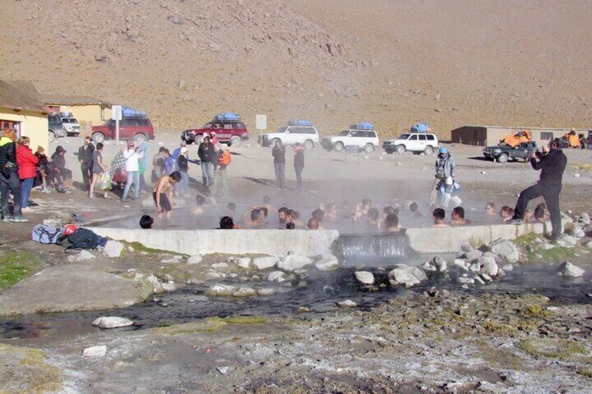 Yongo group clients enjoying the hot springs of Laguna Polques