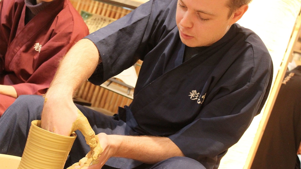 Man on the Japanese Pottery Making Experience in Omotesando