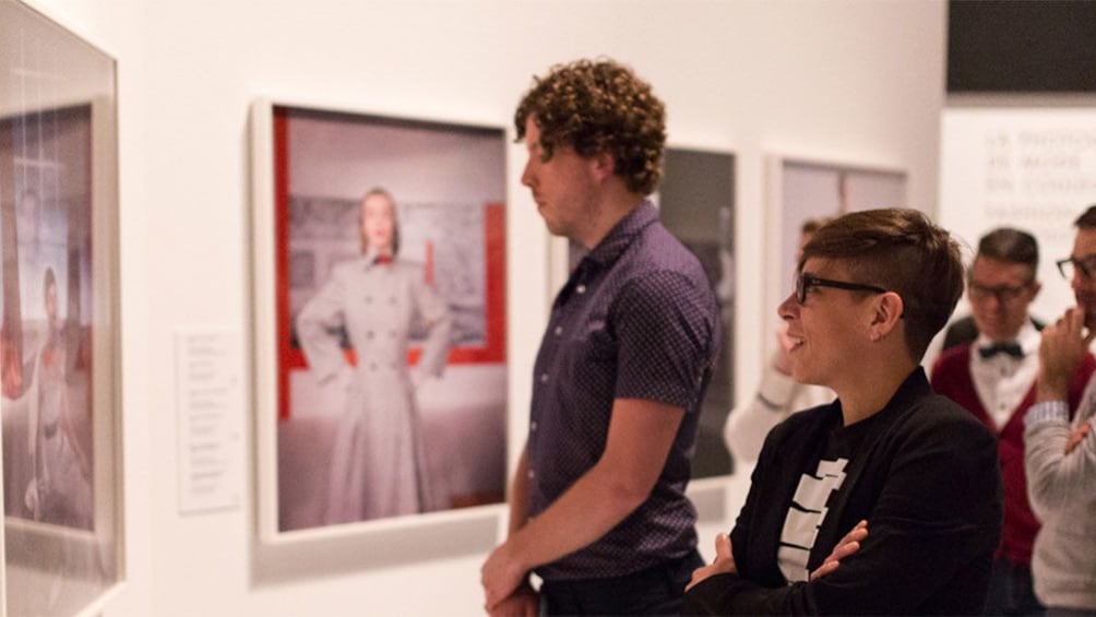 Apri foto 4 di 5. Museum goers looking at artwork at the Musee McCord in Montreal