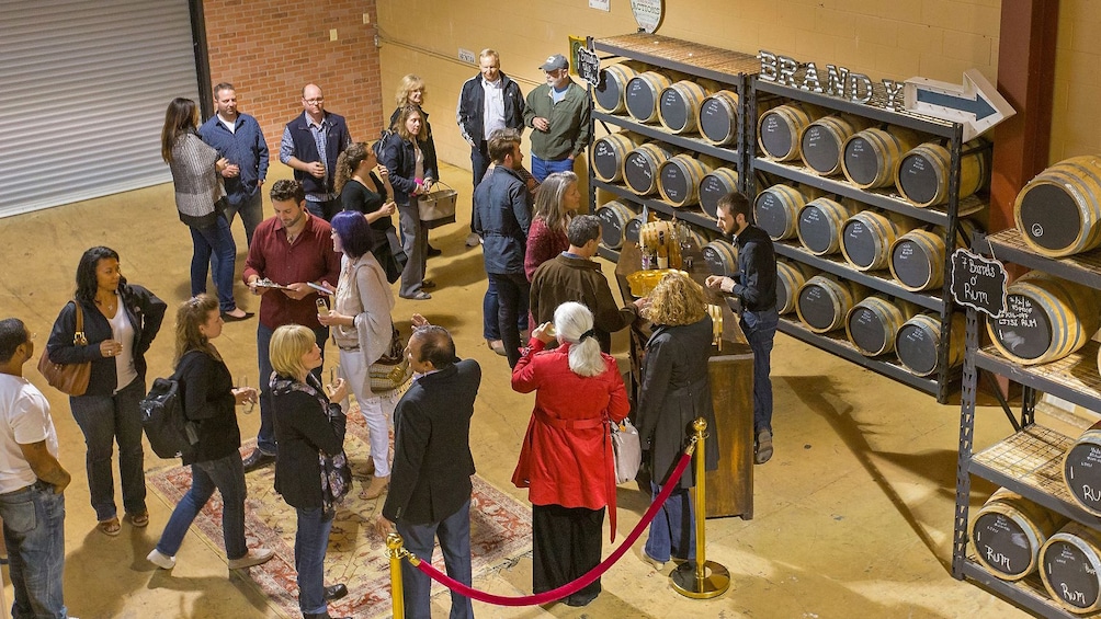 people tasting at distillery