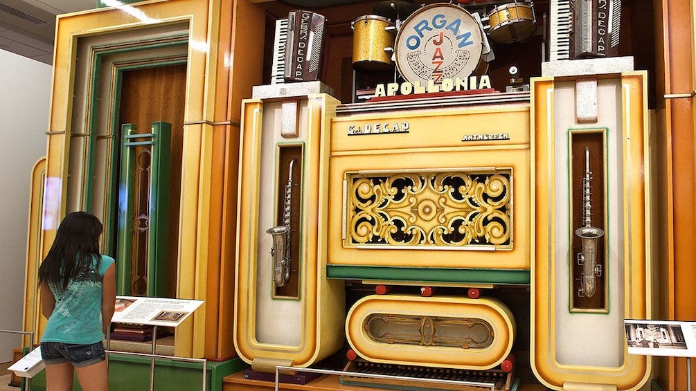 Woman looking at a large organ at the Musical Instrument Museum in Phoenix