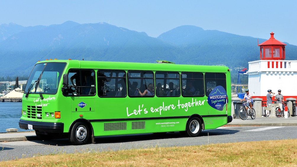 Tour bus near lighthouse on the coast in Vancouver