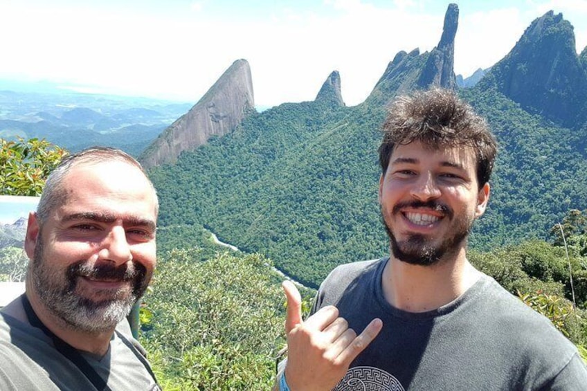 Our guide with a happy customer at the top of the hiking in Serra dos Órgãos National Park 