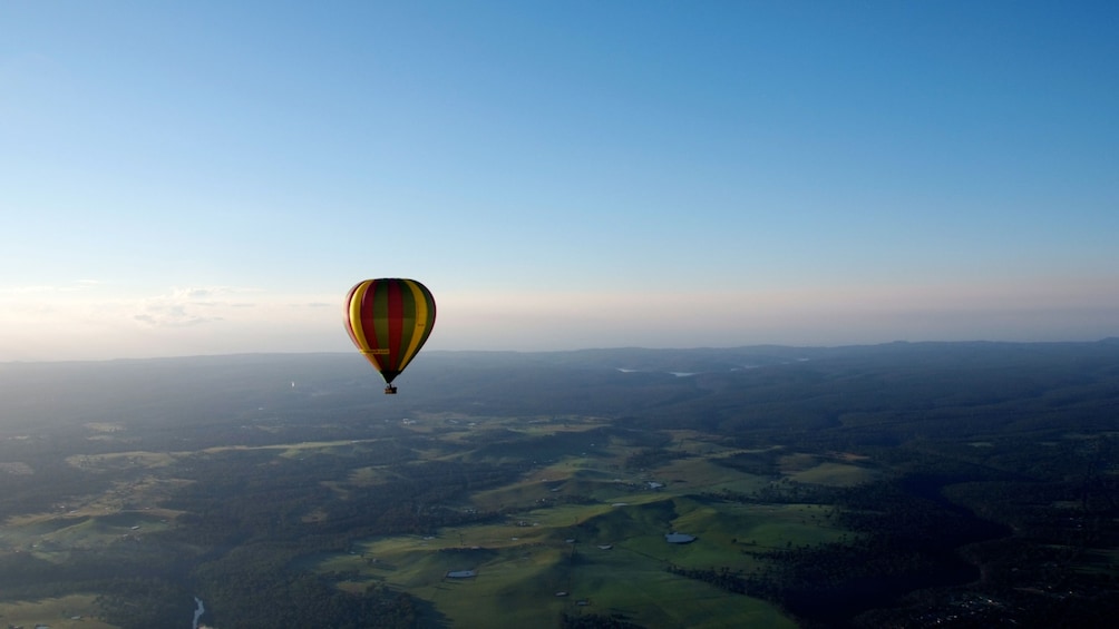 hot air ballon over landscape in Sydney