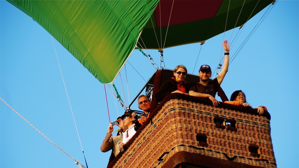 People enjoying hot air ballon ride in Sydney