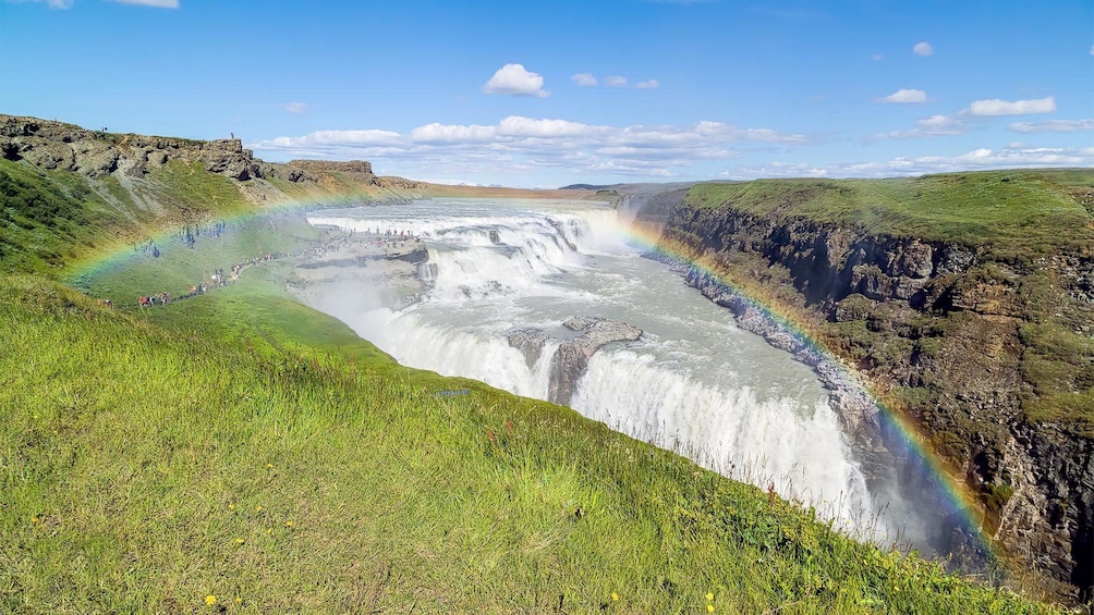 Rainbow over the waterfalls in Reykjavik