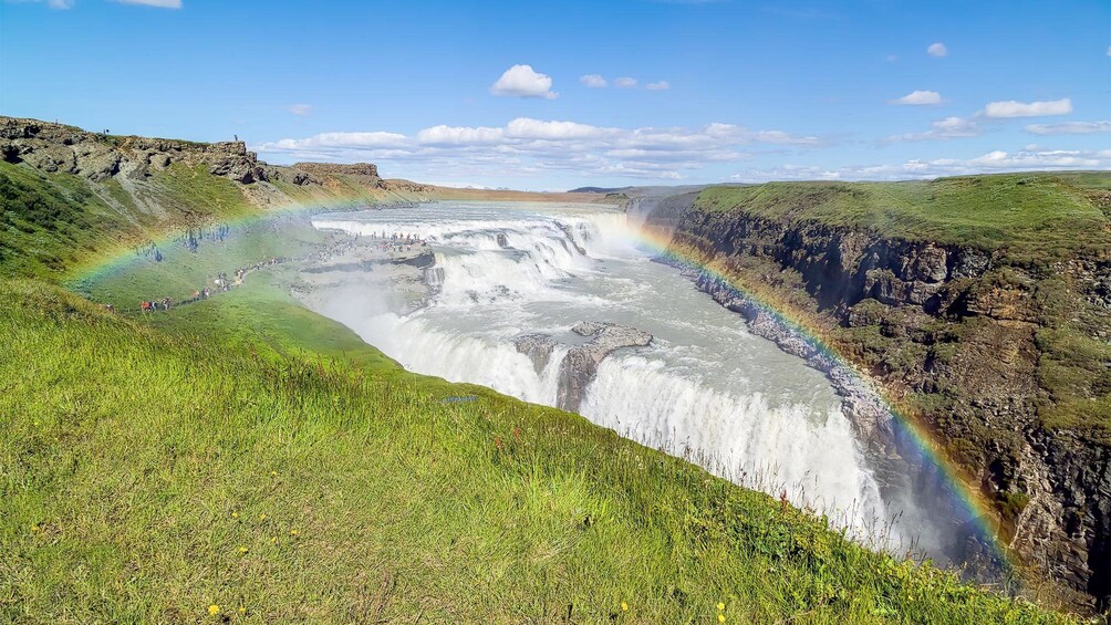 Rainbow over the waterfalls in Reykjavik