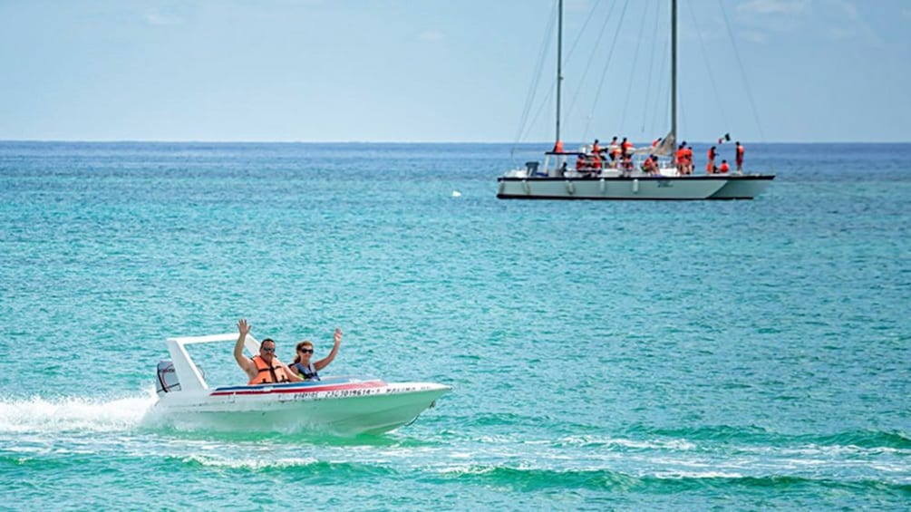 Two boats of people in Cancun