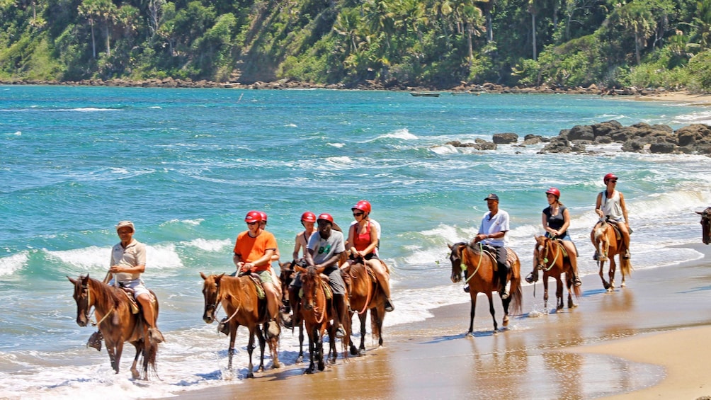 Show item 1 of 10. Horseback riding on the beach in Puerto Plata, Dominican Republic