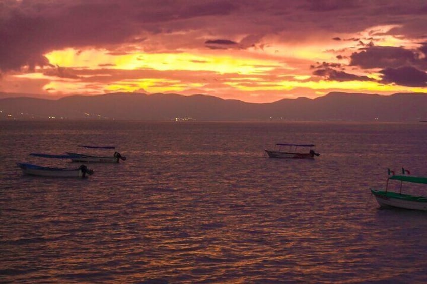 Sunset on the boardwalk of the town of Chapala.