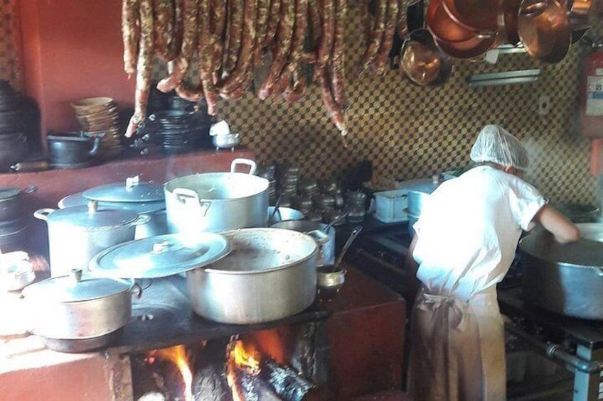 Wood stove and artisan sausages being smoked - Restaurante Xapuri