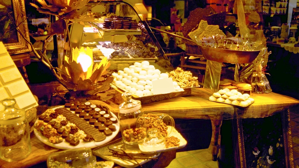 Show item 3 of 5. Table full of chocolates in St. Louis, MO