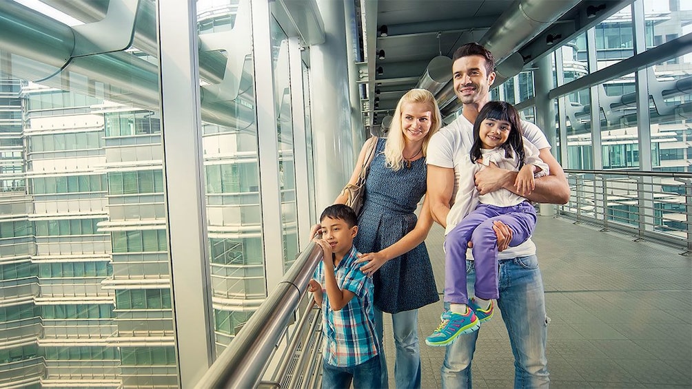 Family at the petronas twin towers in Kuala Lumpur, Malaysia