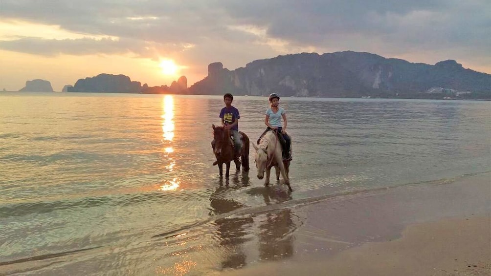 Krabi Horse Riding during sunset at Ao Nam Mao Beach 