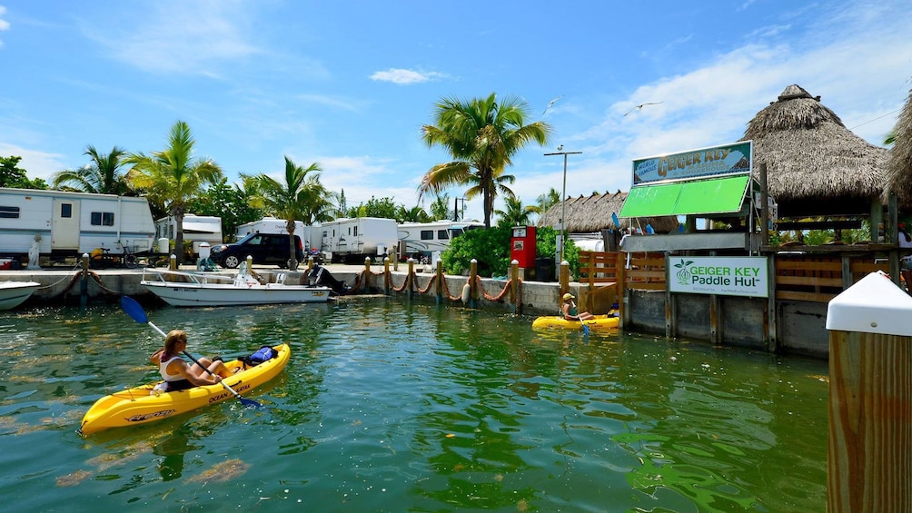 Kayakers paddle up to paddle hut in Florida Keys