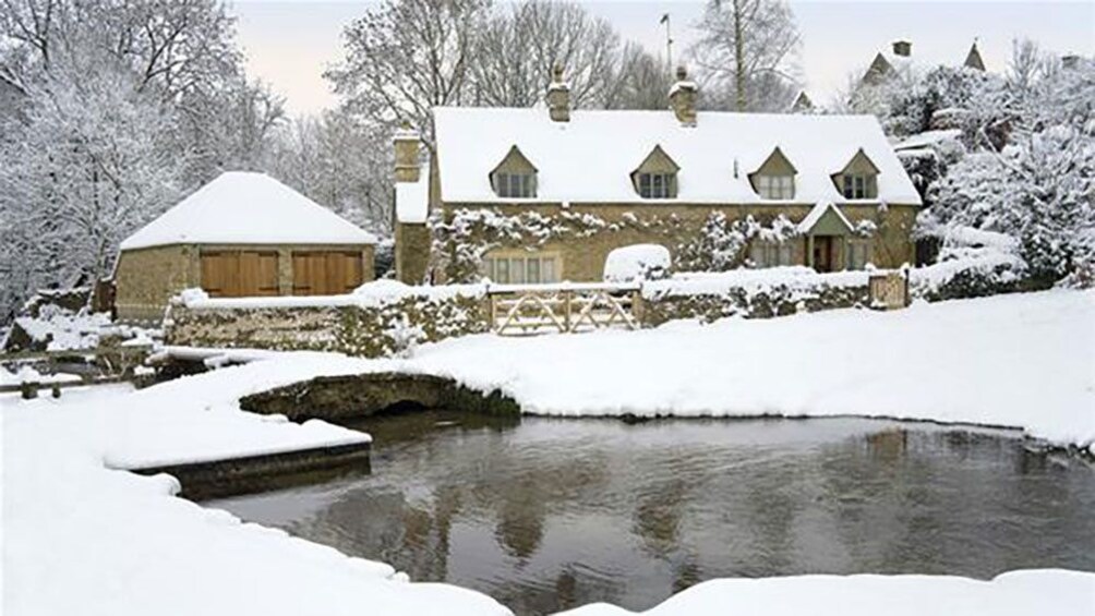 Snow covered English cottage