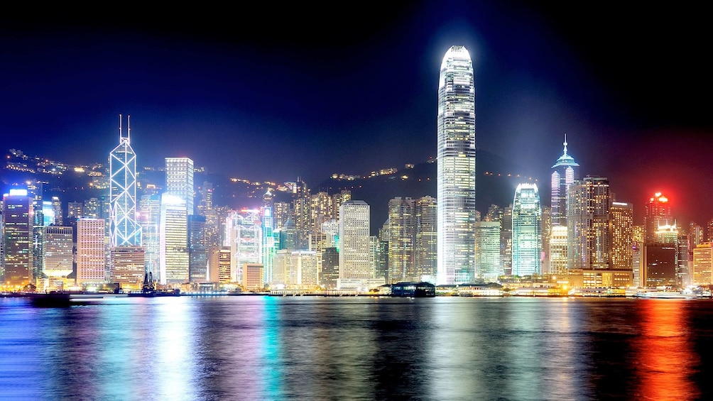 Show item 1 of 10. Vibrant city lights on the Hong Kong City Tour with Dinner Cruise