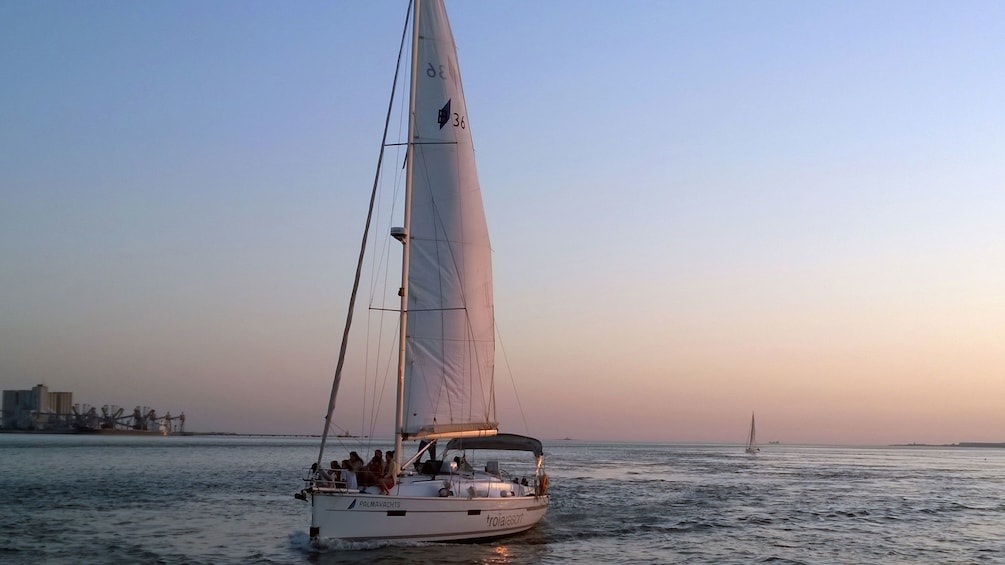 Sail boat tour at sunset in Lisbon
