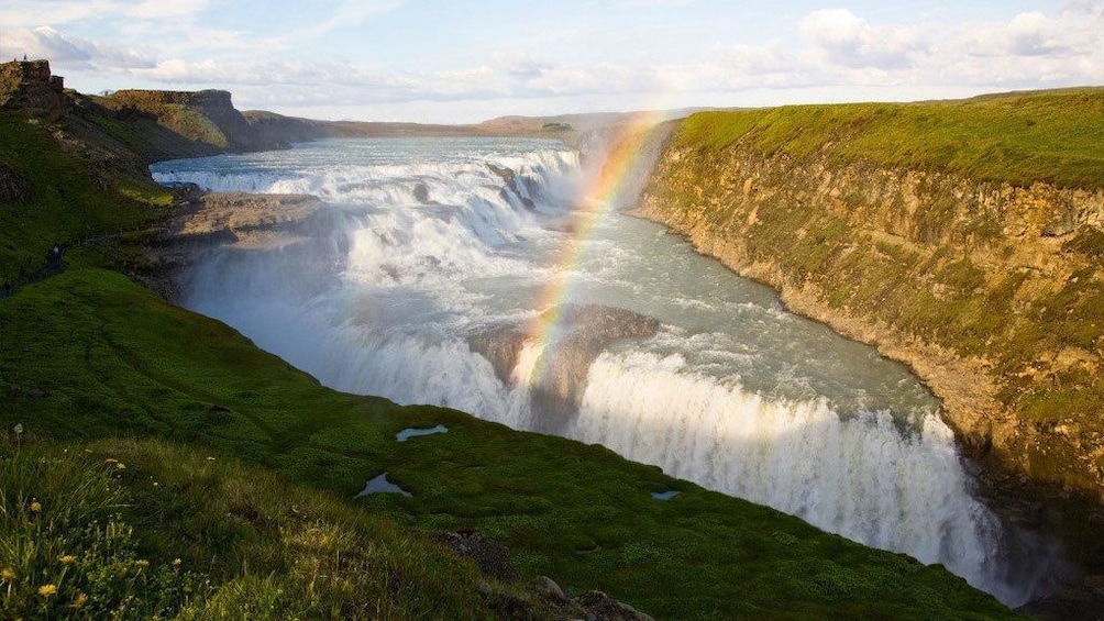 Rainbow over a waterfall in Reykjavik