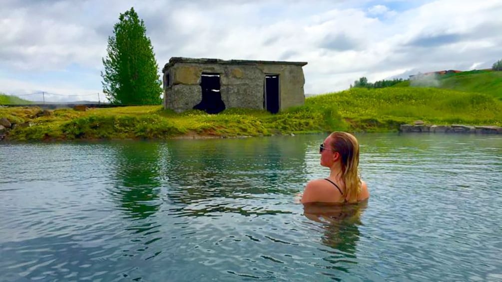 Woman swimming in a hot spring