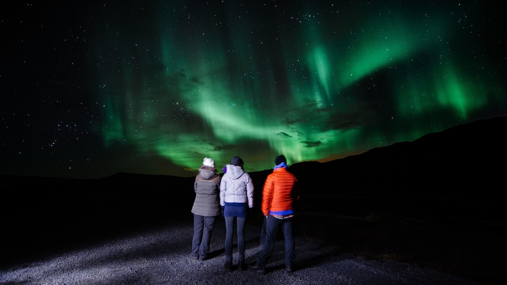 Group looking at the Northern Lights in Reykjavik