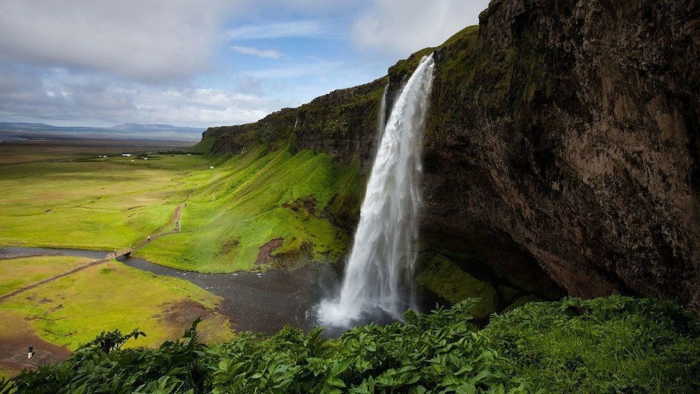 Waterfall off of a cliff in Iceland