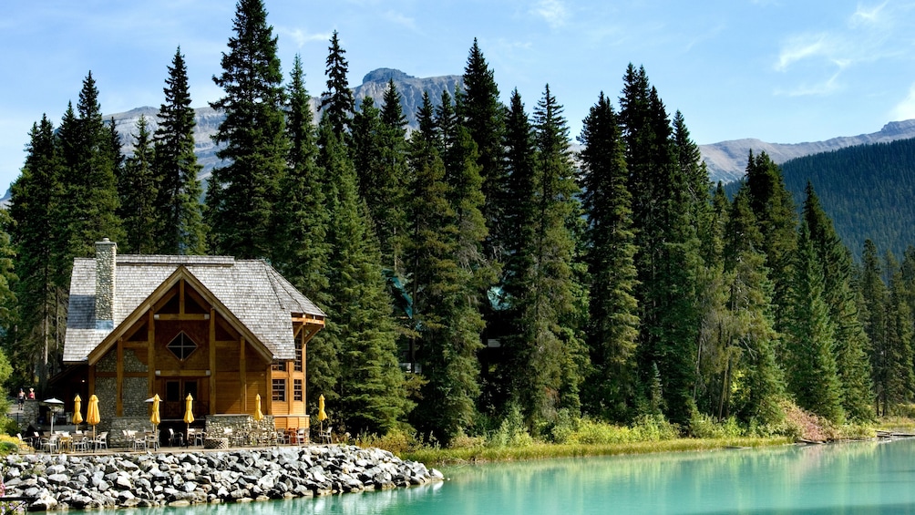 Show item 4 of 5. A cabin on a lake in Canada
