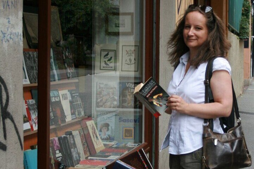 Me, your guide, couple of years ago in front of one of my favorite shops: a second-hand bookstore