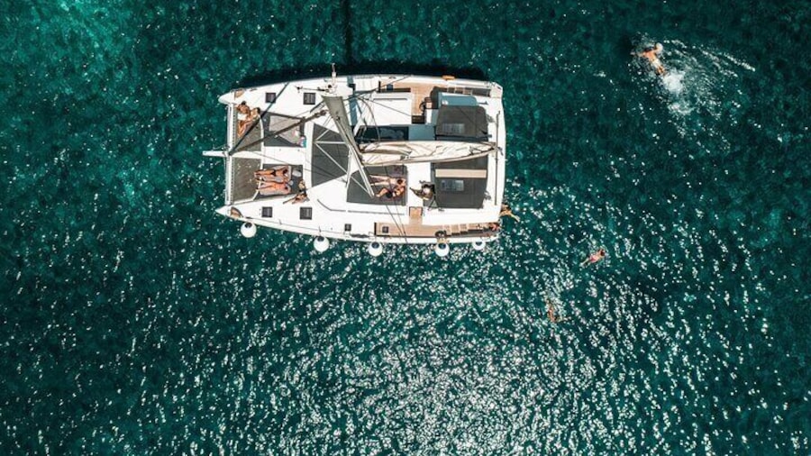 SP Catamaran Majestic Cruise in Santorini with Snacks, Meal & Drinks