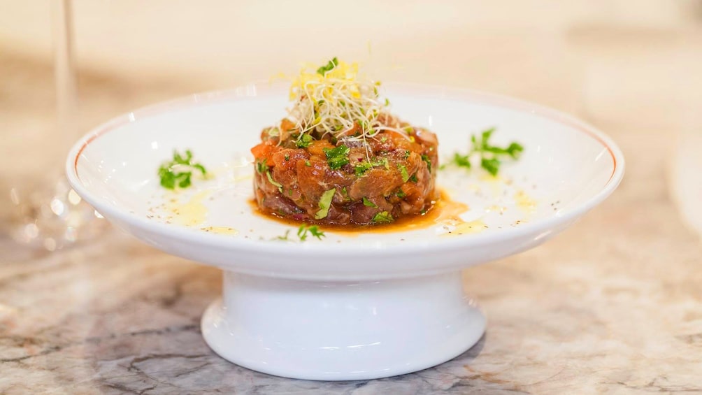 A puck of food on a large platter