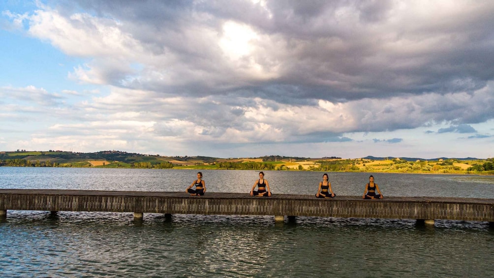 Picture 4 for Activity Chiusi: Yoga Lesson and Picnic on the Shore of Chiusi Lake