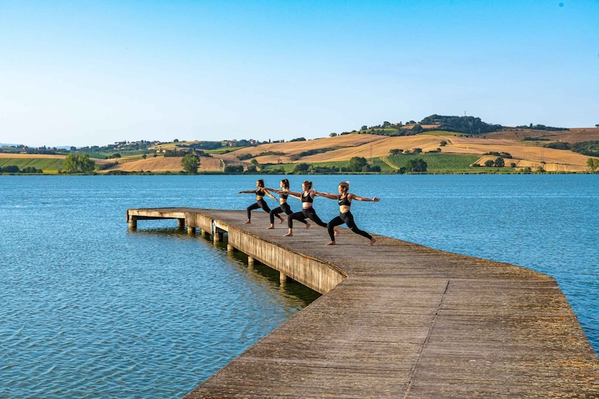 Picture 1 for Activity Chiusi: Yoga Lesson and Picnic on the Shore of Chiusi Lake