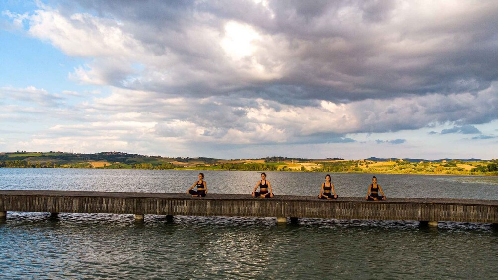 Picture 4 for Activity Chiusi: Yoga Lesson and Picnic on the Shore of Chiusi Lake